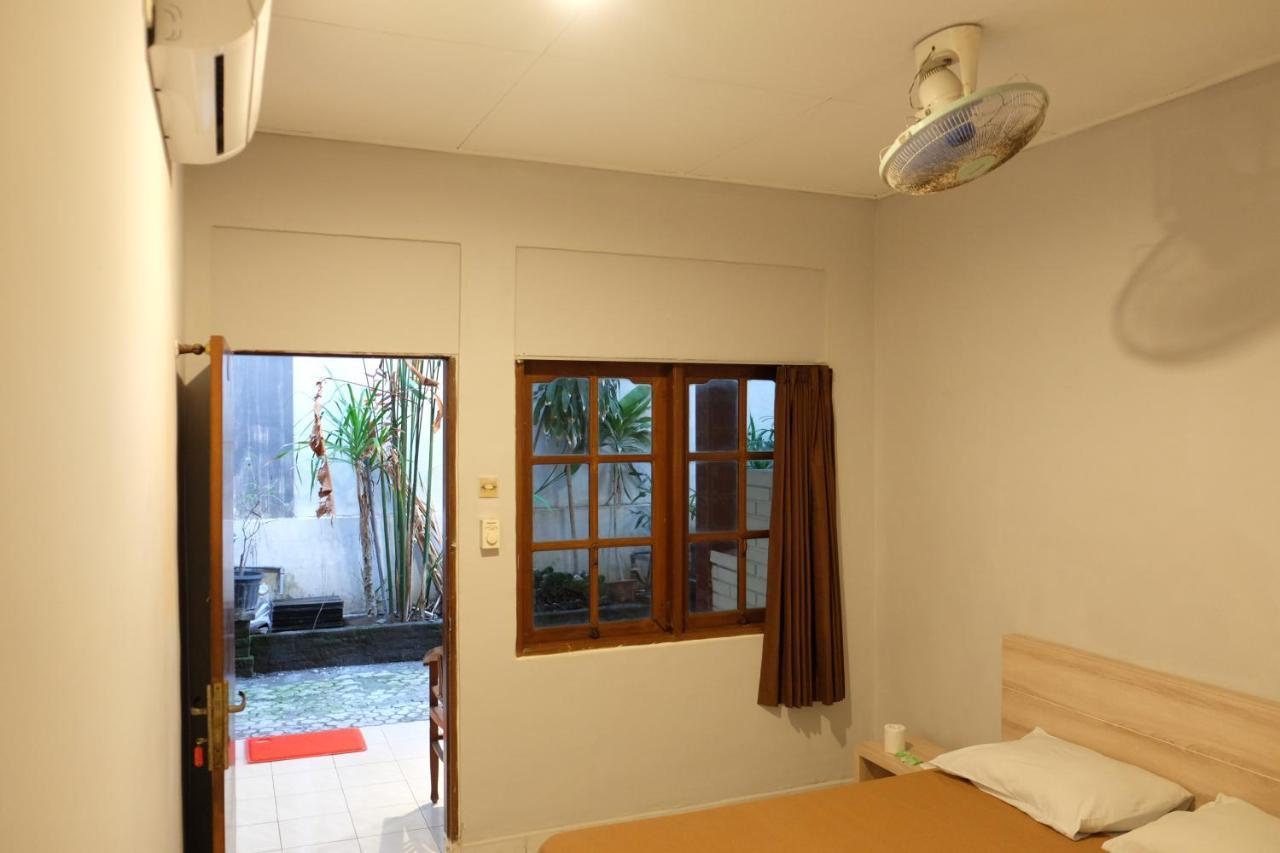 Palm Garden Kuta Hotel กูตา ภายนอก รูปภาพ
