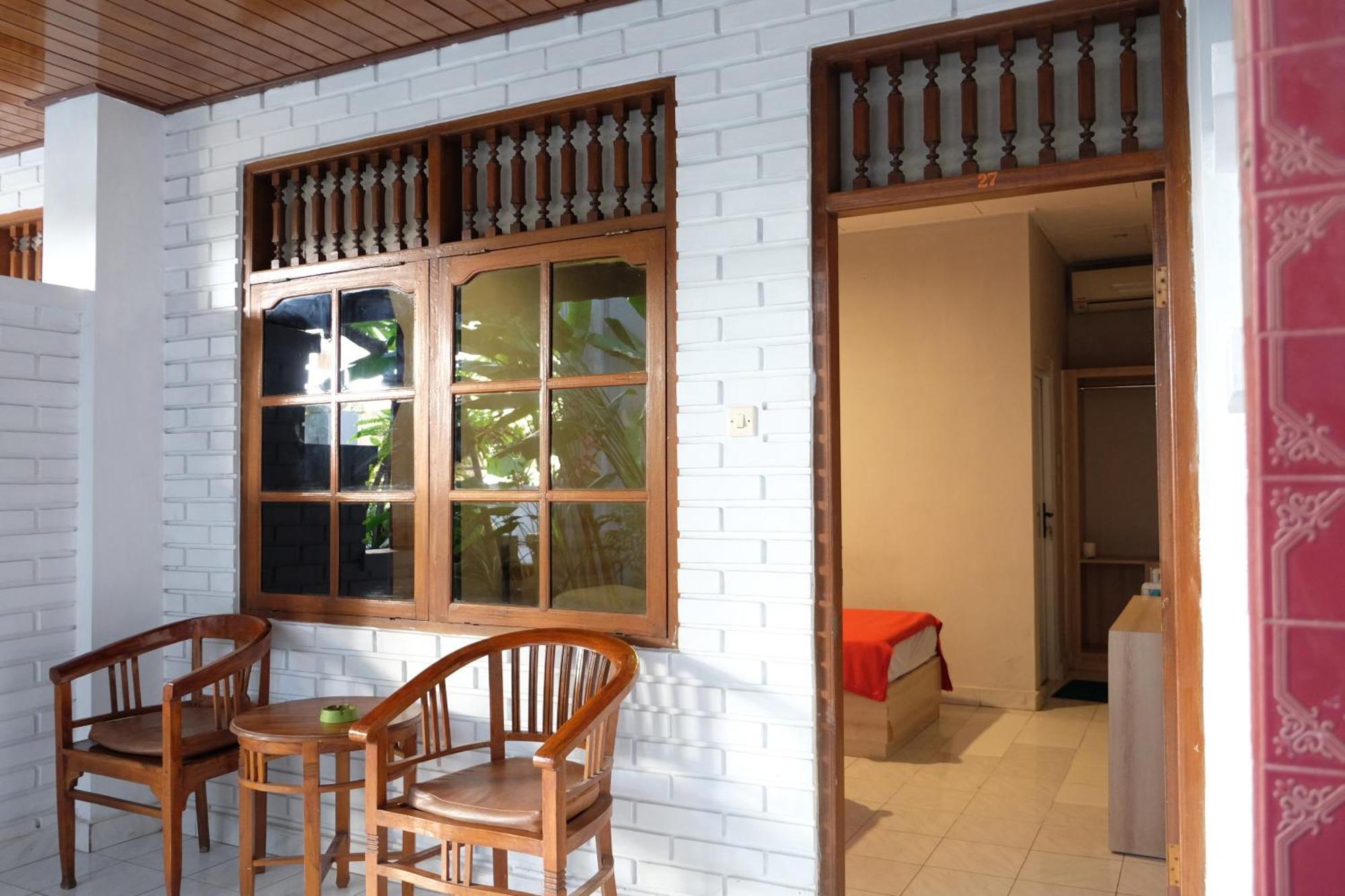 Palm Garden Kuta Hotel กูตา ภายนอก รูปภาพ